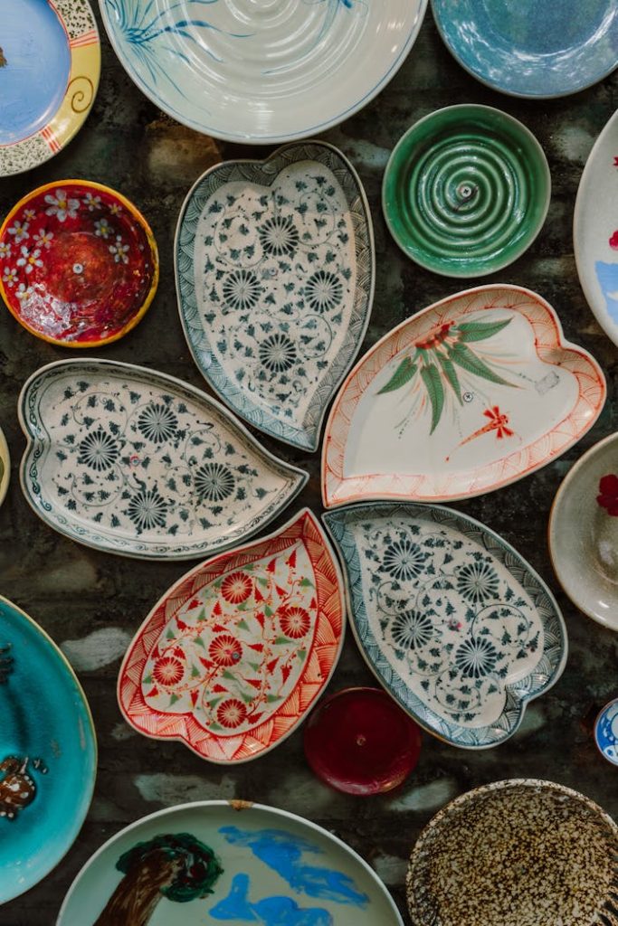 The Art of Drawing Readers In: Your attractive post title goes here A vibrant collection of handmade ceramic plates featuring traditional and artistic patterns.