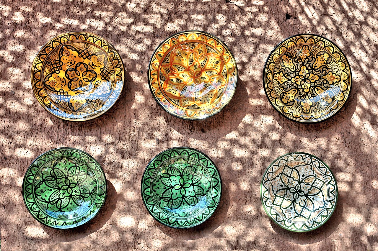 Beautifully crafted ceramic plates with intricate Moroccan designs in Tamegroute, Morocco.